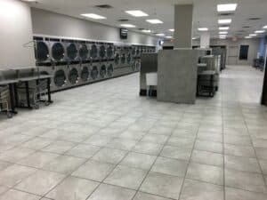 Clean and safe environment at New Hope Coin Laundry with ample parking and bright lighting.