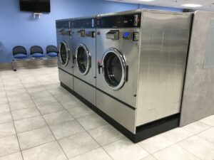 A safe and secure laundromat in New Hope, MN, with bright lighting, security cameras, and a comfortable atmosphere.